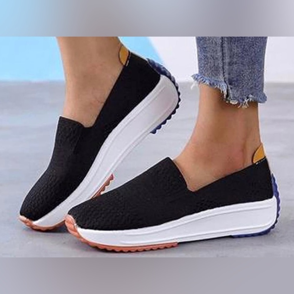 Black slip ons never worn from amazon size 9.5-10/42. Original packaging.